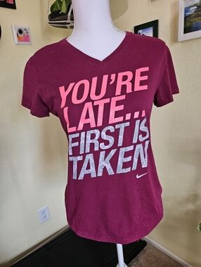 Nike Women’s Burgundy Short Sleeve V-Neck Graphic Tee with Pink & White Print